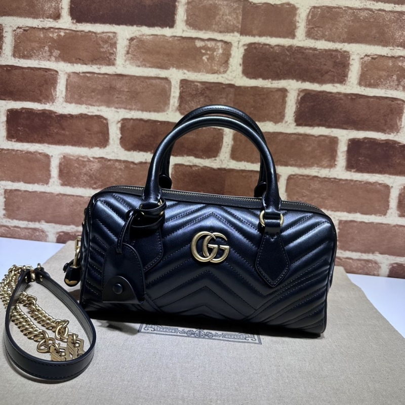 G*u*i top handle bags